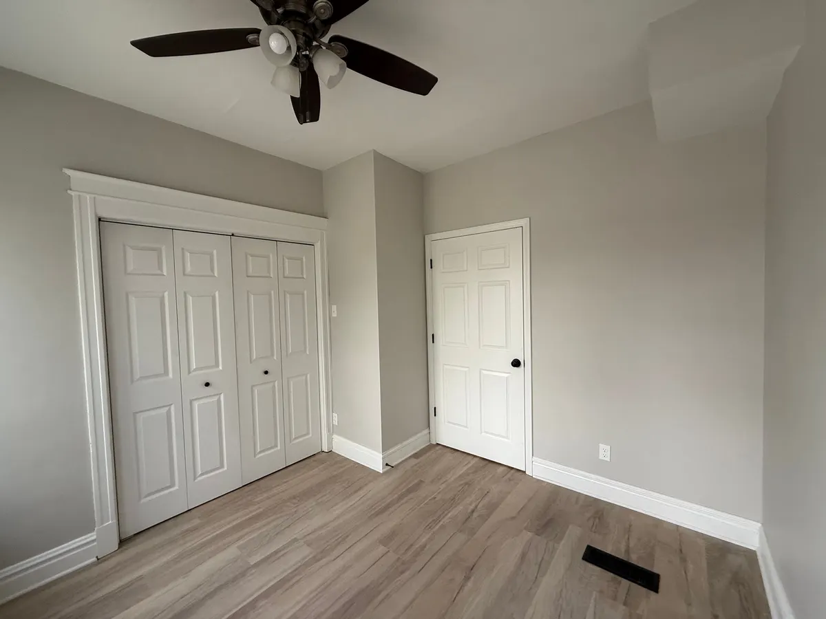 A rental unit with new LVP flooring, ready for a tenant